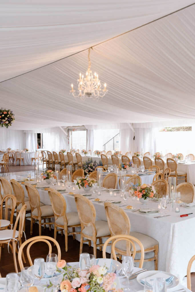 tented Santaluz Club wedding reception with tables and chairs