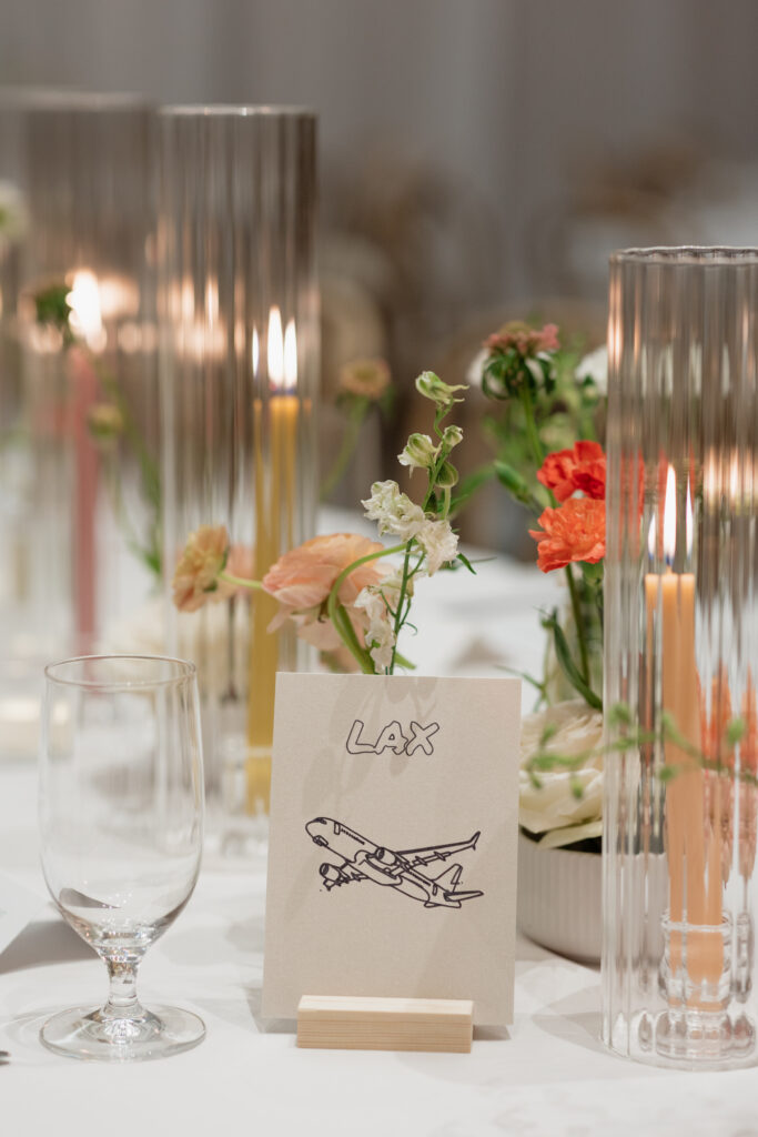 Candlelit wedding table featuring California-inspired destination details