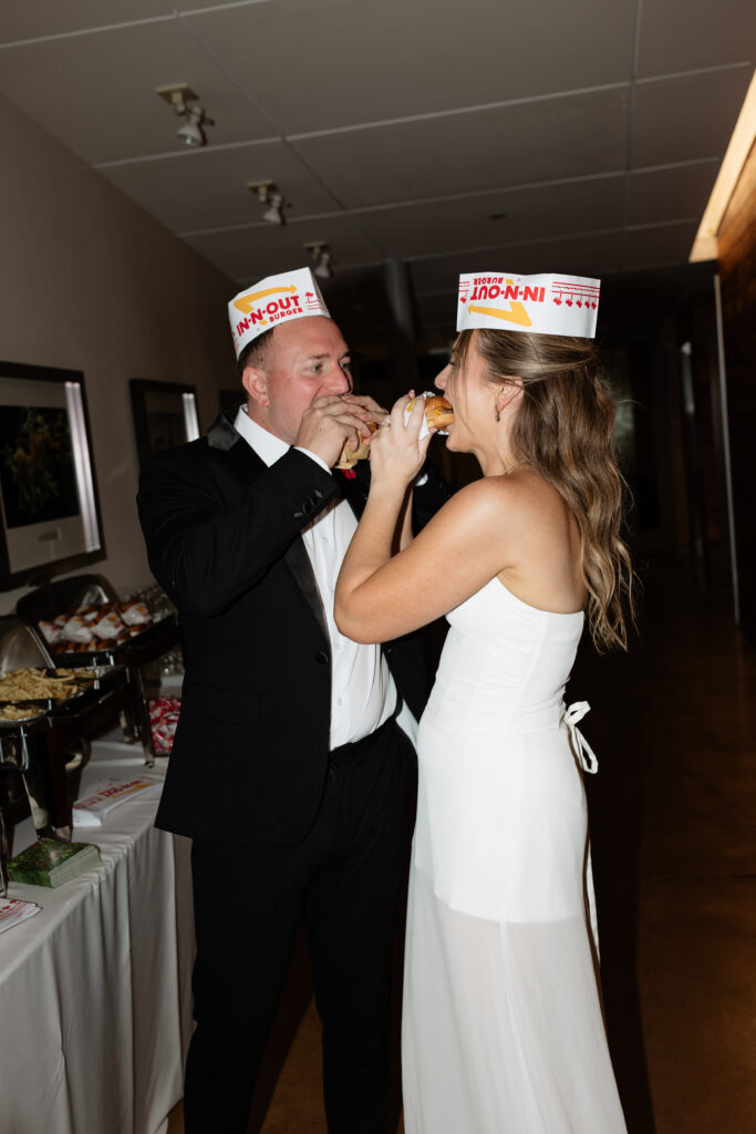 Ben and Lauren sharing an In-N-Out burger during their California wedding celebration 
B
Bri Berry Photography
+6