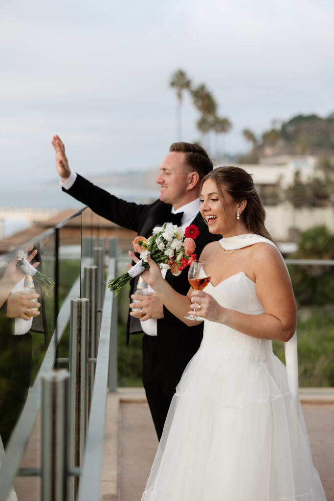 Ben and Lauren celebrating their wedding with cocktails overlooking the California coast 
B
Bri Berry Photography
+5