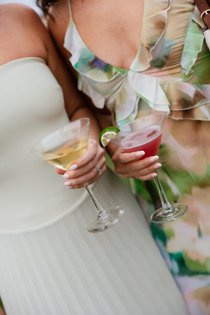 Guests holding cocktails during Ben and Lauren’s La Jolla wedding